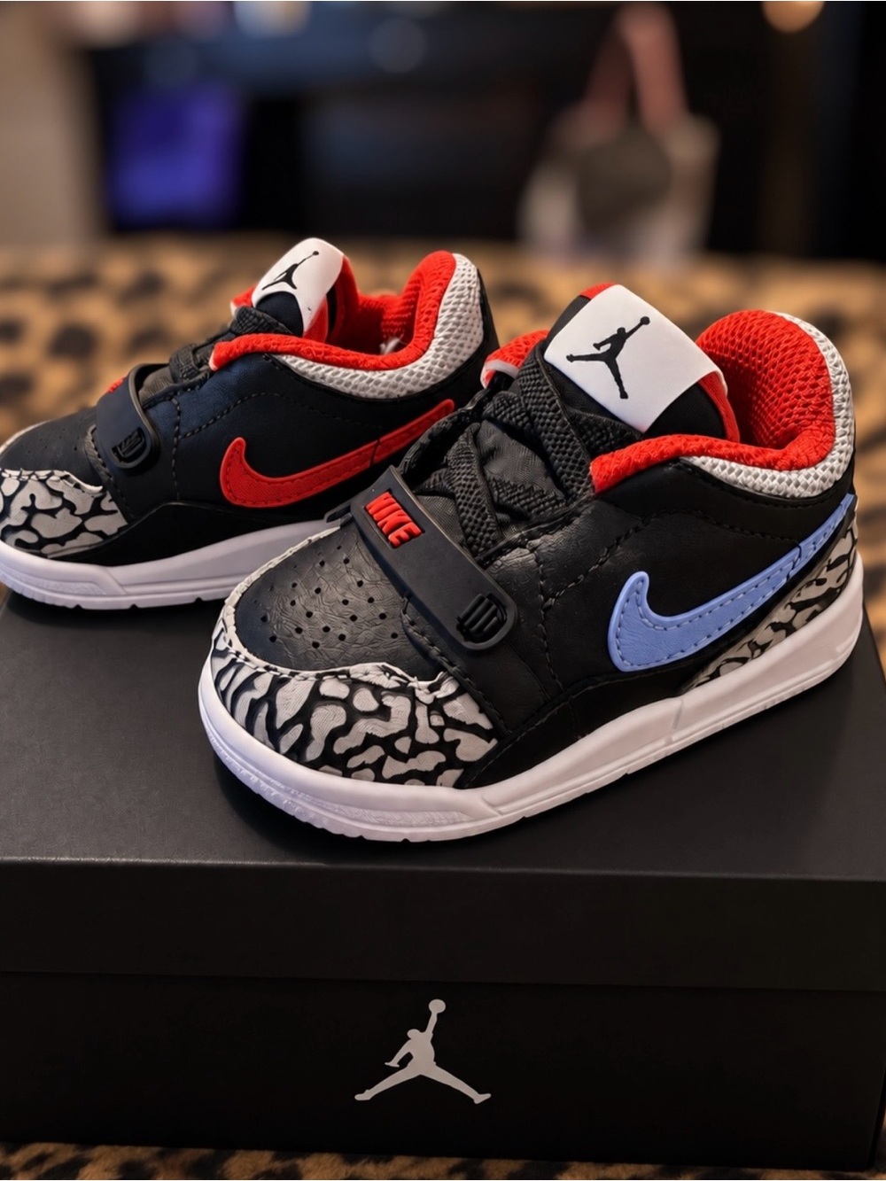 Jordan Kids Dual Swoosh Sneakers in Black, Red, and Light Blue